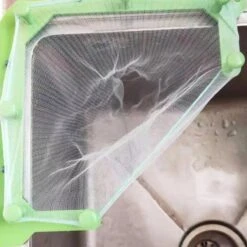 Merkloos Gootsteen Organizer - Gootsteen Afval Netje - Gootsteenontstopper - Spoelbak - Incl. 50 Netjes 13 Merkloos Gootsteen Organizer - Gootsteen Afval Netje - Gootsteenontstopper - Spoelbak - Incl. 50 Netjes -Schoonmaakartikelen Winkel 1200x1200 742